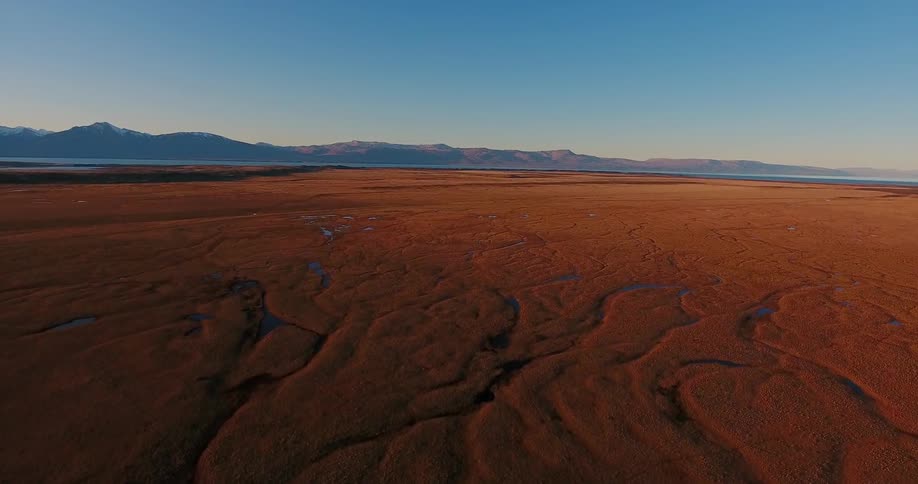 Water streams through the open landscape