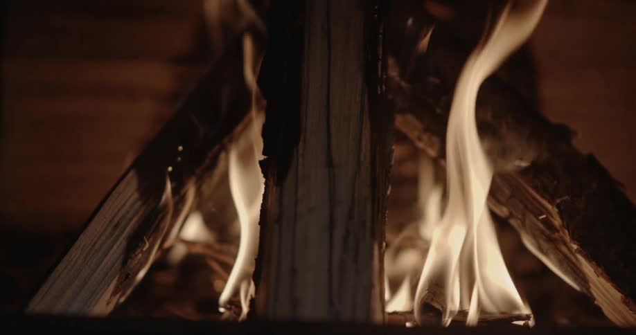 Fire blazes brightly with wood as kindling