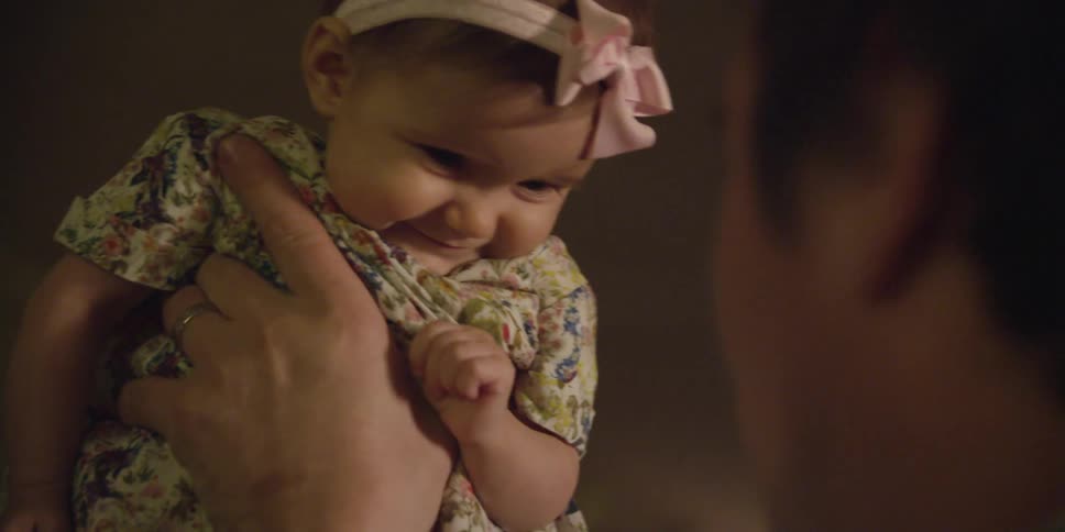 A person holding a baby