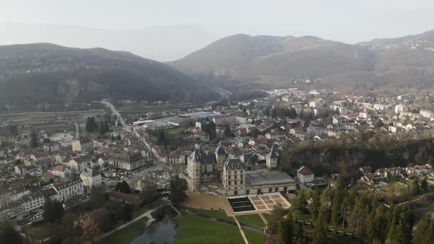 The large town is surrounded by mountains