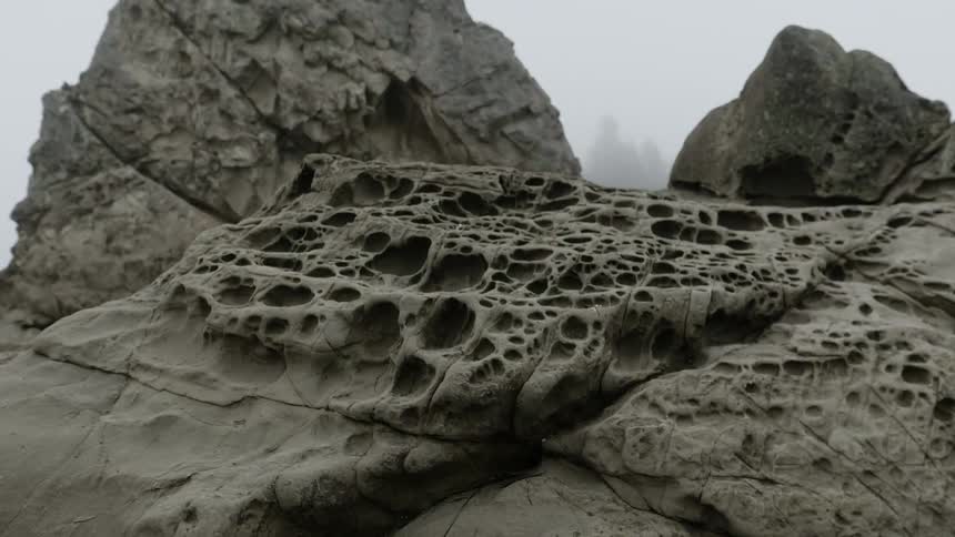 Large holey rocks on a cloudy day