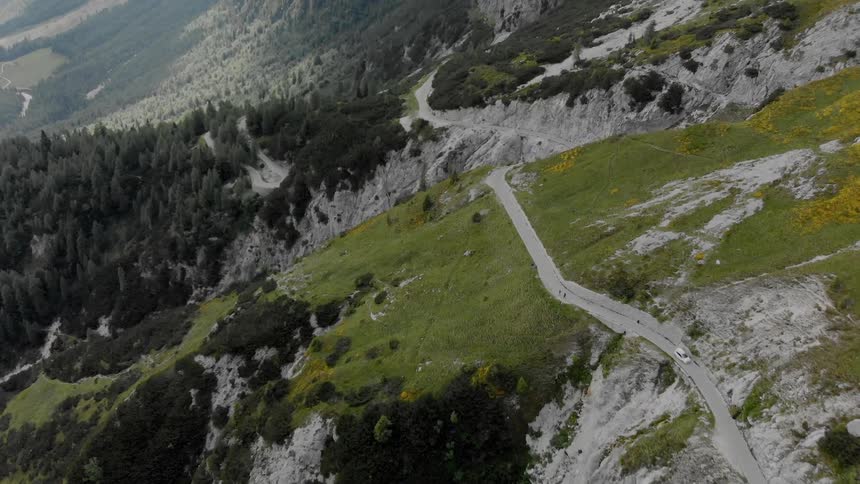 A car travels on a mountain road