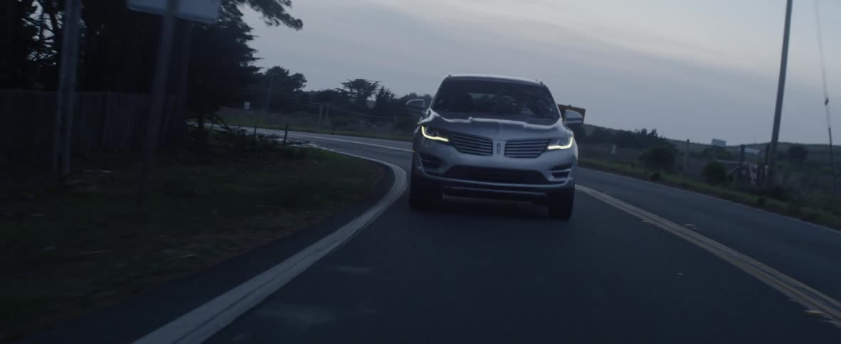 A car travels on a road
