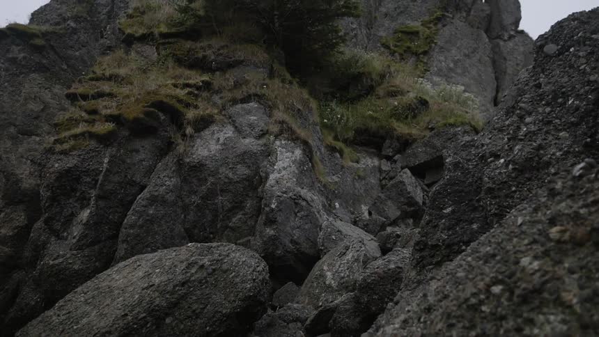 Moss grows on some of the rock face