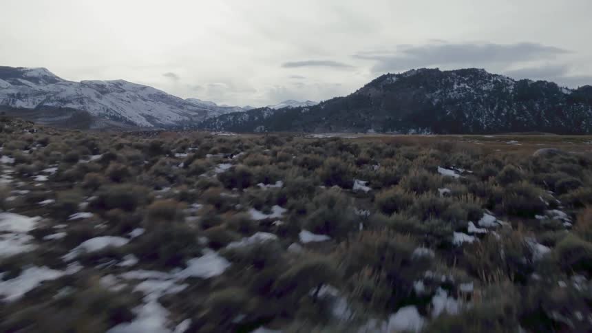 Mountains with snow covered valley floor