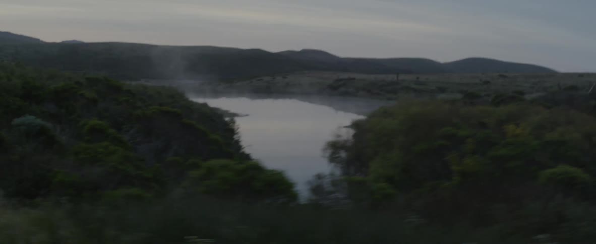 Steam rises from a small creek in the country