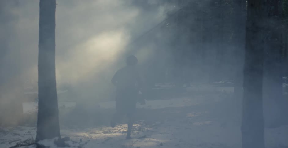 Child runs through smoky land