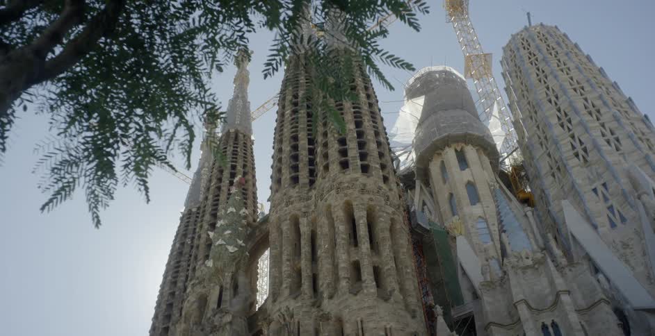 Tall antique building with large peaked towers