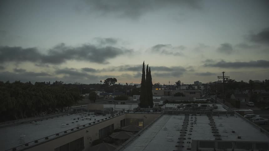 Timelapse of clouds over a city