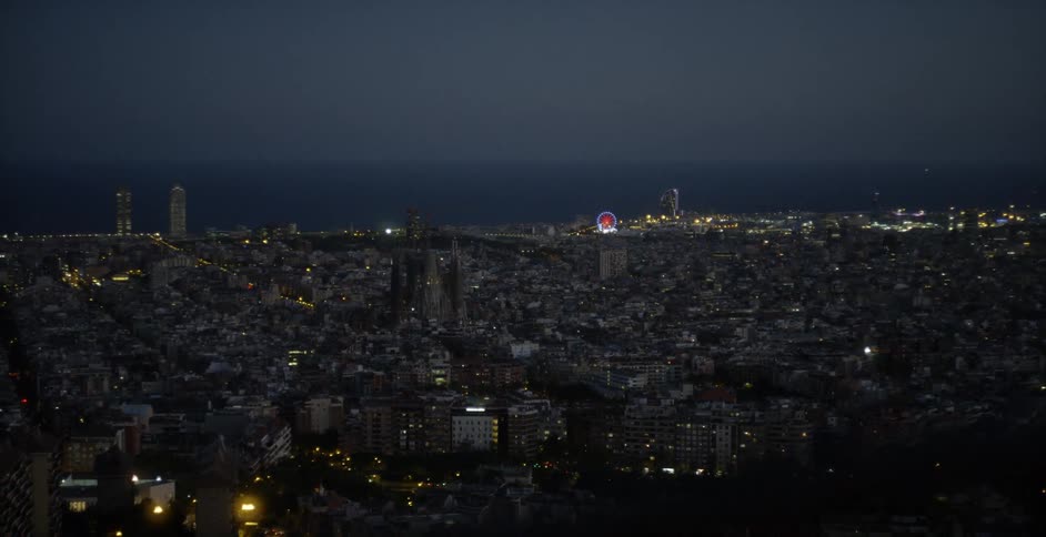 City buildings illuminate the night sky