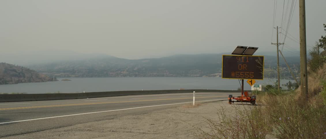 A delivery truck drives down the road