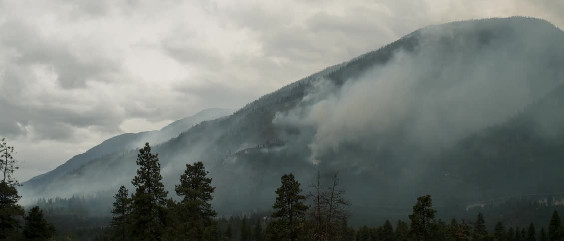 A fire burns on the mountain
