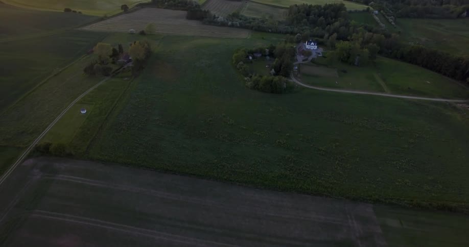 Grass and crops cover the farmland