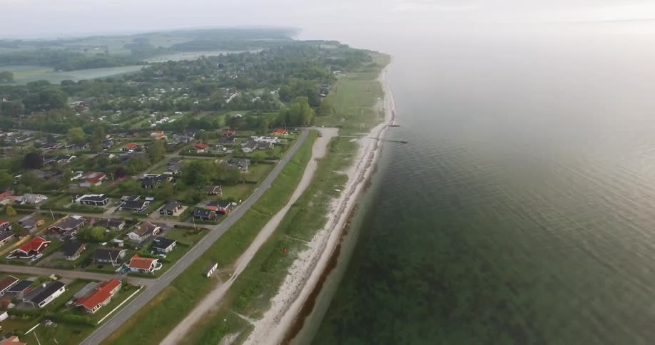 Ocean meets a suburban shoreline
