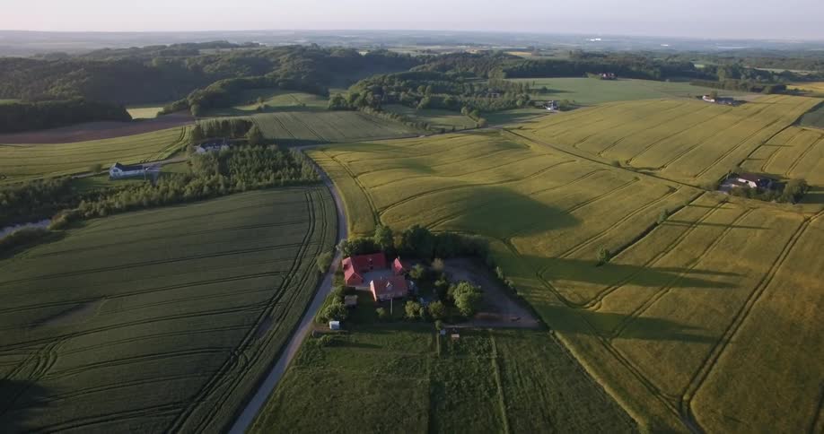 Vast farm land with sparse houses in between