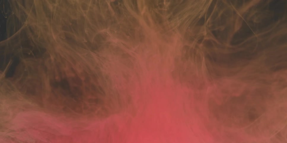 Red liquid billows and swirls