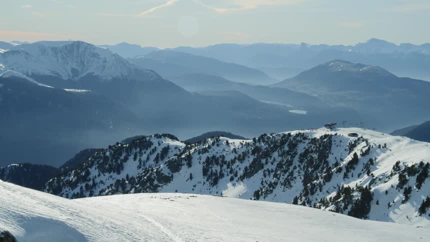 Snow covers the mountain landscape