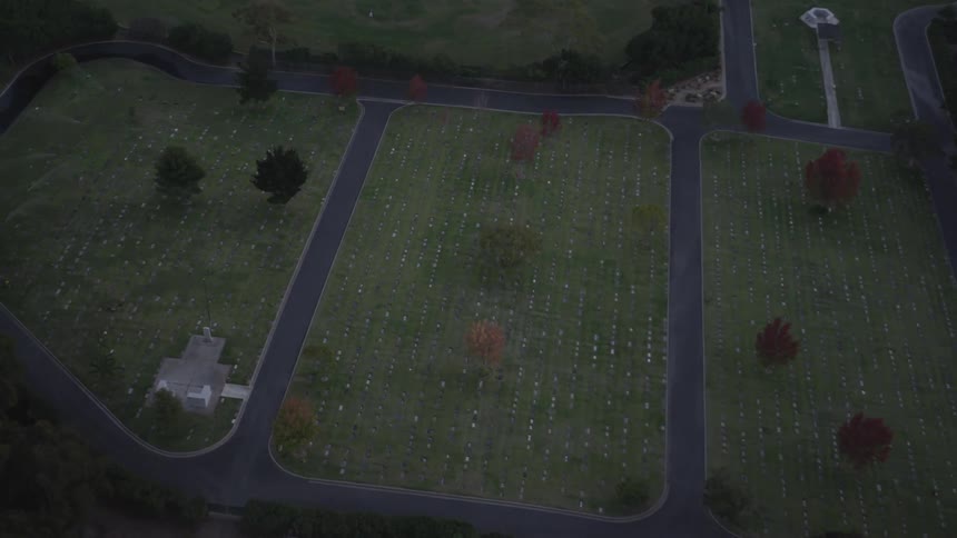 Aerial view of a home with a baseball field