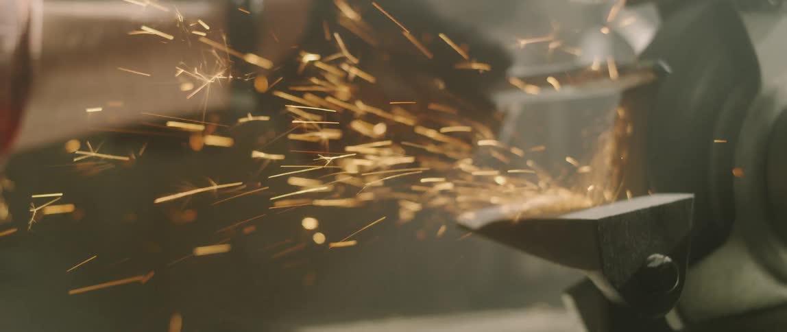 Sparks fly from a grinding tool