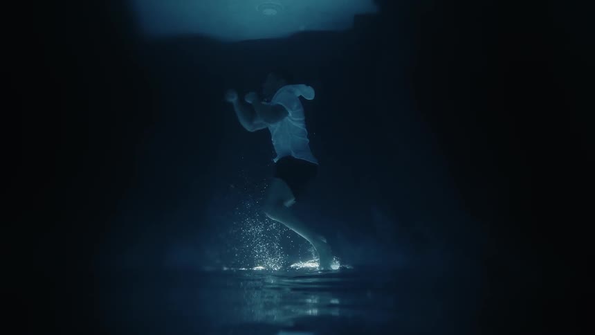 Man under water is punching