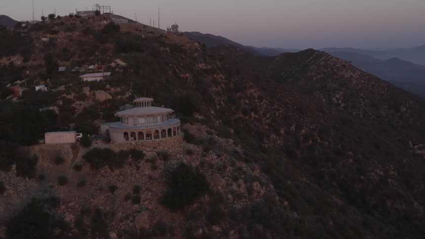 A town sits on top of a peak