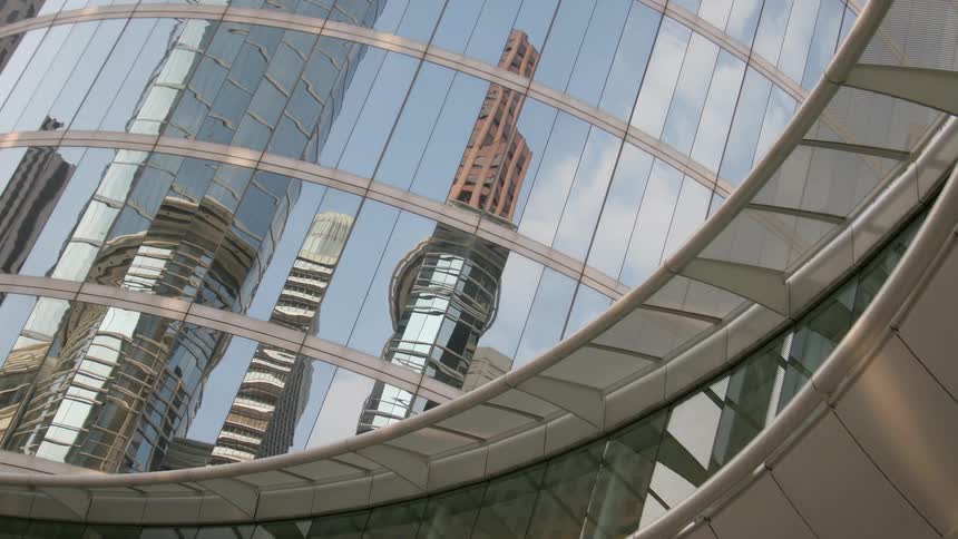 Reflection of a city in building windows