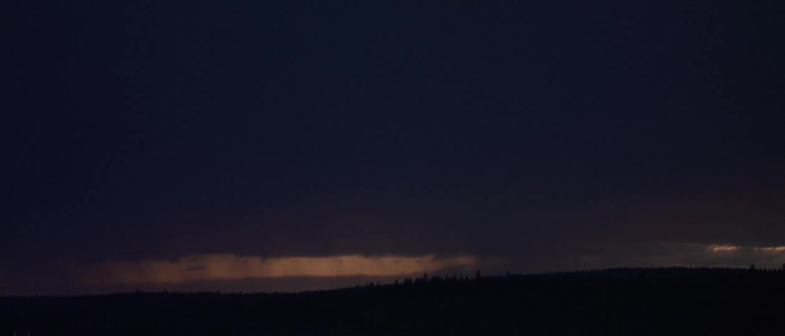 Lightning flashing in night sky during storm