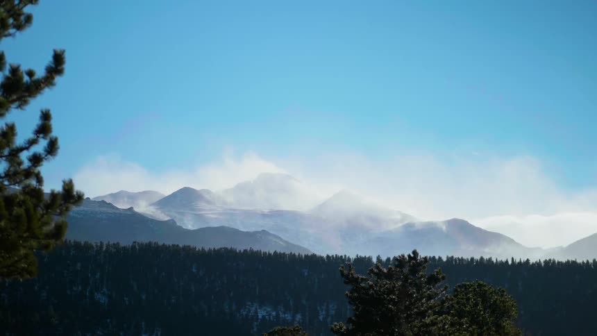 Fog rising from mountain tops in wilderness