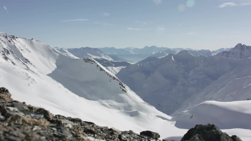 Snow covered mountains on sunny day