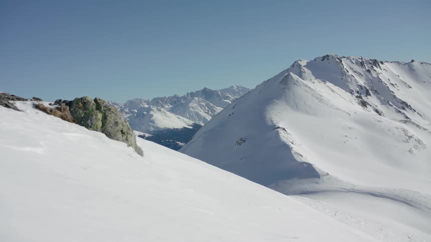 Snow covered mountains on sunny day