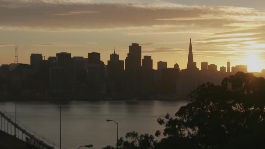 A boat runs across a city lake or river