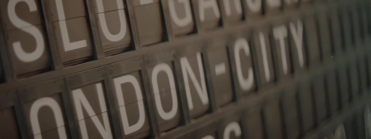 The sign is flipping letters showing the name of a place