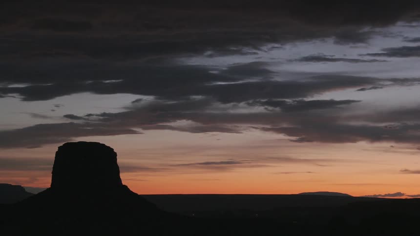 The sun sets in the desert