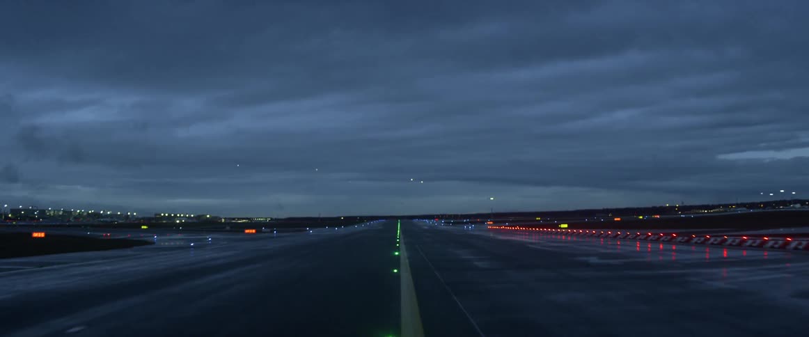 Lights illuminate the airport tarmac