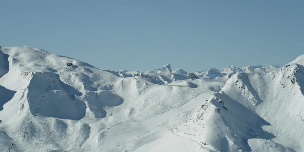 Snow covered ridges and peaks on a sunny day