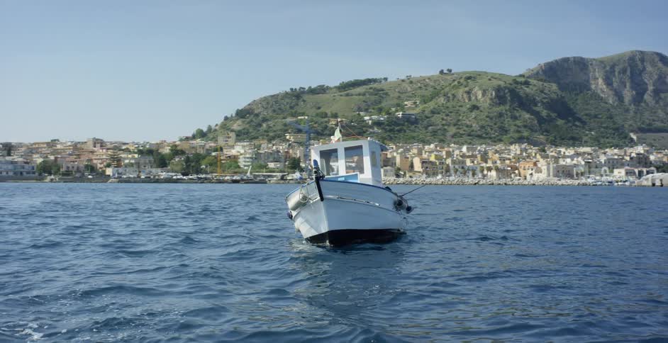 Boat floating on the open water