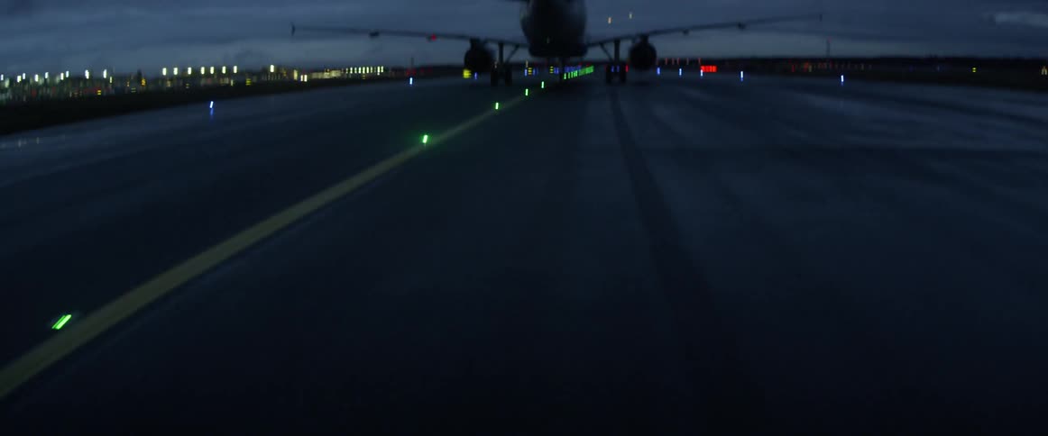 The plane is moving down the runway