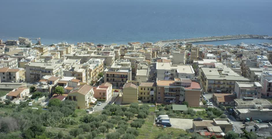 Many buildings grouped together near the water