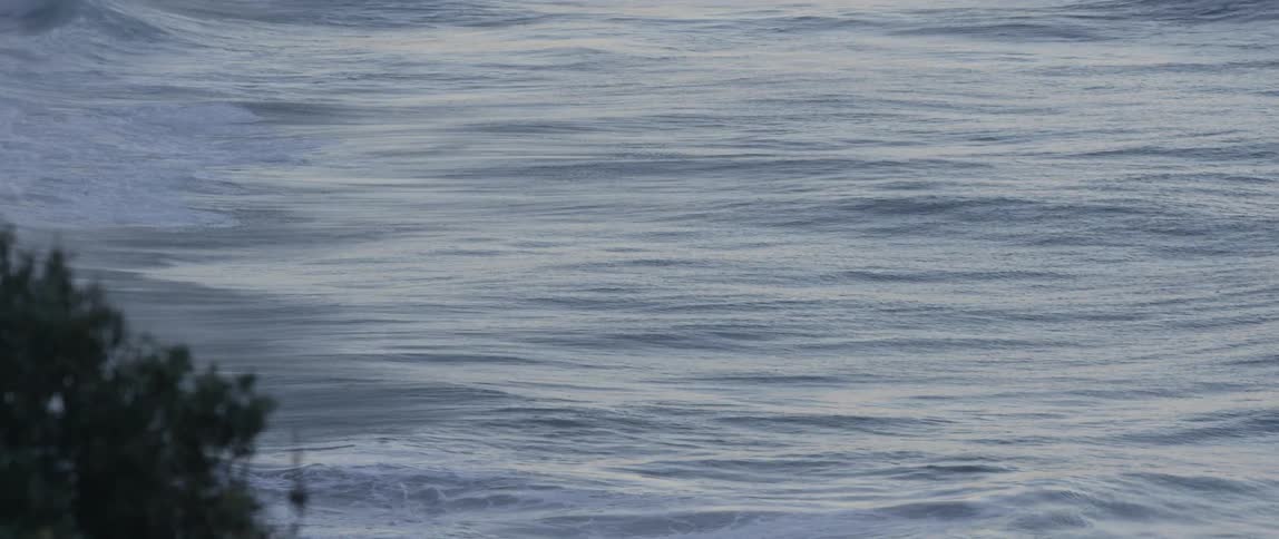 Waves flow on a body of water