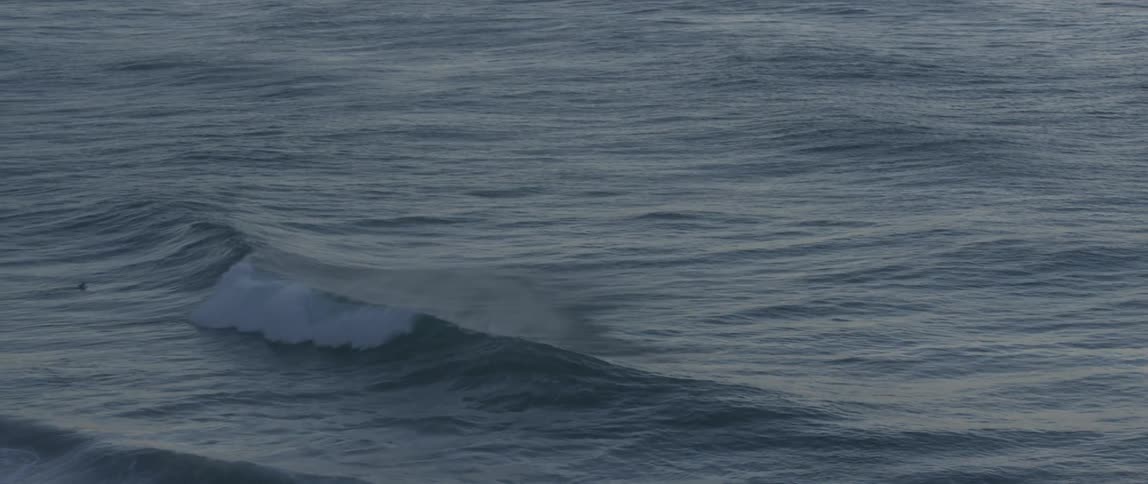 Waves crash on a rocky beach