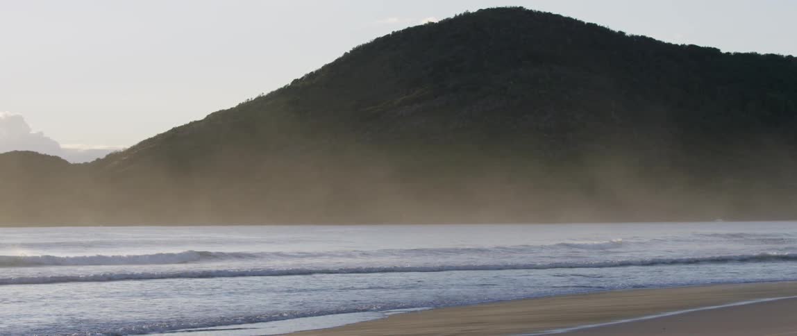 Waves crashing against the beach