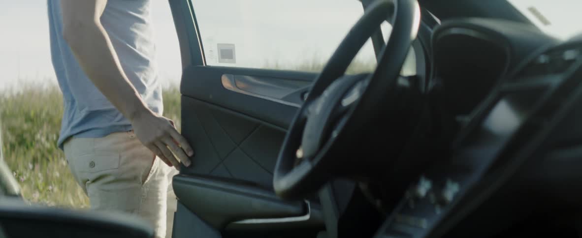 Man climbs out of a car