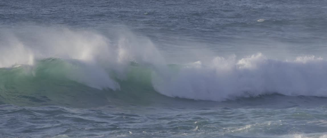 Large waves crashing in the water