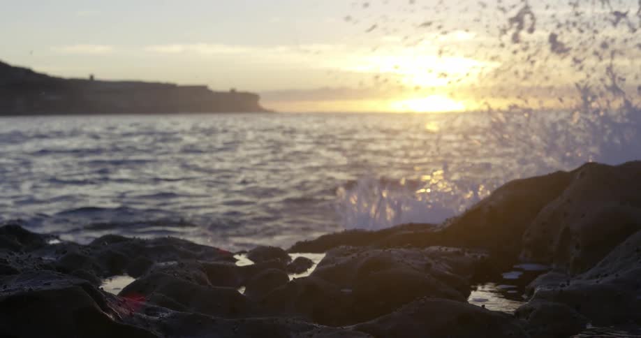 Waves crashing against rocks
