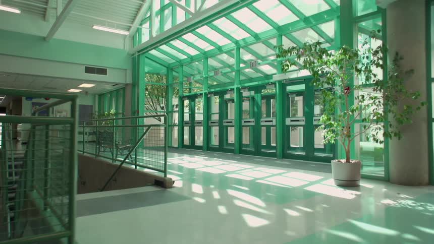 A person walks through a large building