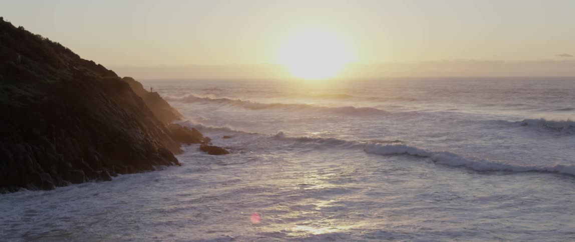 View of a rough shoreline near some cliffs