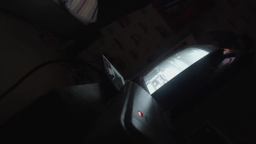 The television set is displaying a video game