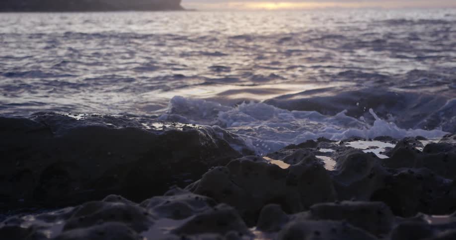 A rocky beach i s shown