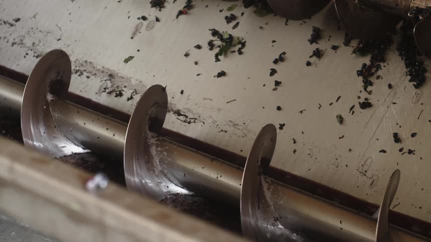 The machine has a metal rod that is spinning