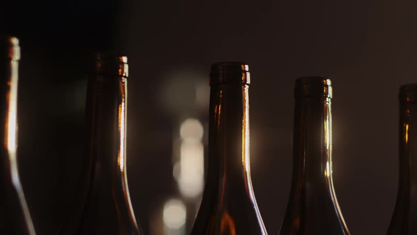 Beer bottles sit on a table